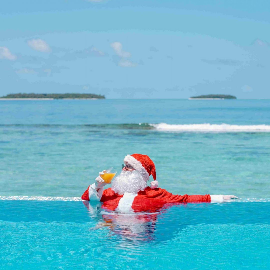 Santa-in-the-pool-Anantara-Kihavah-Maldives-Villas_11zon-scaled